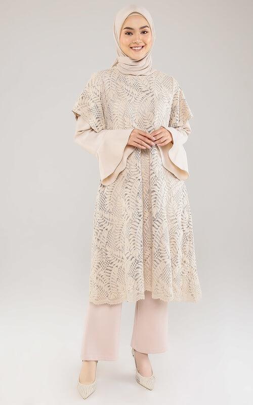 Tunik Brokat Motif Daun dengan Lengan Terompet